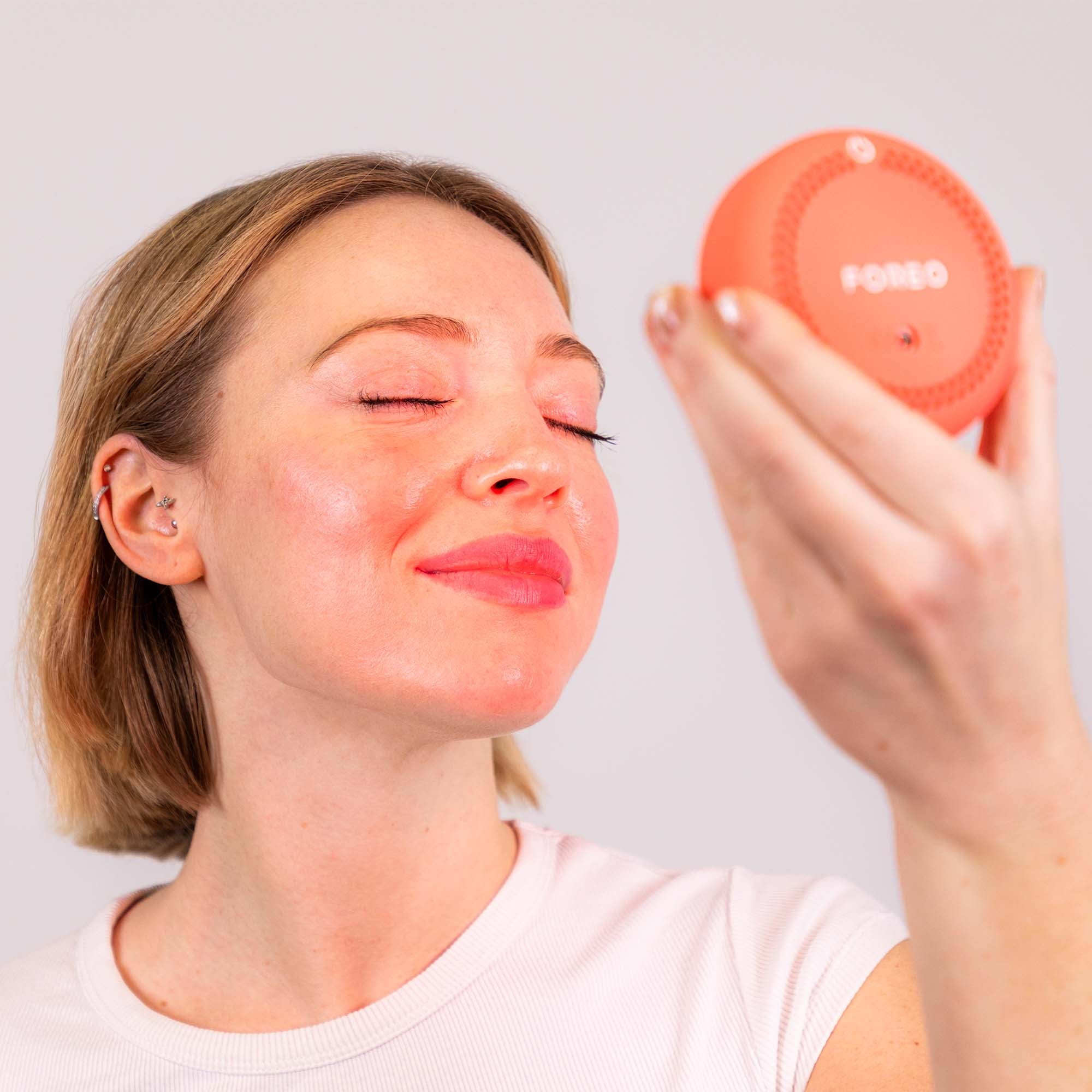 FOREO UFO™ LED Lighthouse Panel Peach – Pannello LED Palm-Size con Luce Rossa e Blu